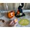 This is a Halloween witch made from a dried gourd. Its witch hat sits next to it. A battery-operated candle is included with your purchase.